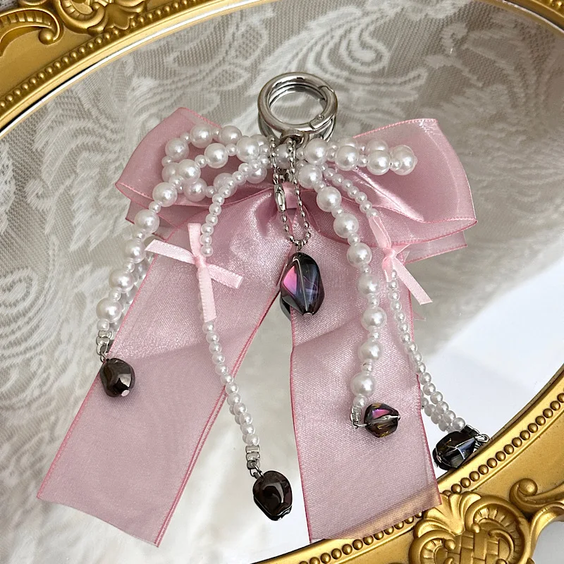 Catena per telefono con fiocco in garza morbida di perle di alta qualità Fascino per borsa per auricolari con fiocco in pizzo stile dolce e fresco nero e rosa