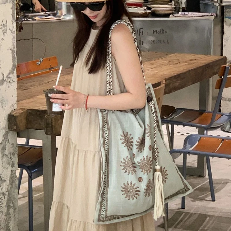 Designer Style Bohemian Linen Bag With Braided Handle Ethnic Floral Embroidered Tote Bag Women Crossbody Shopper Bag With Tassel view 5