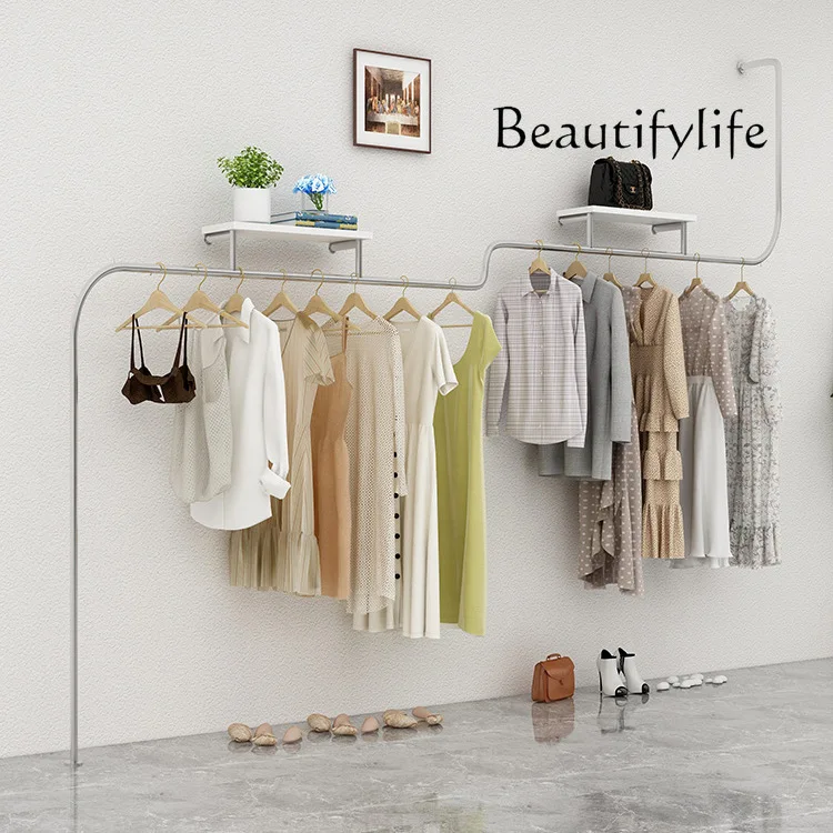 Clothing store wall display rack, simple floor-to-ceiling wrought iron hanger, wall-mounted clothes display rack