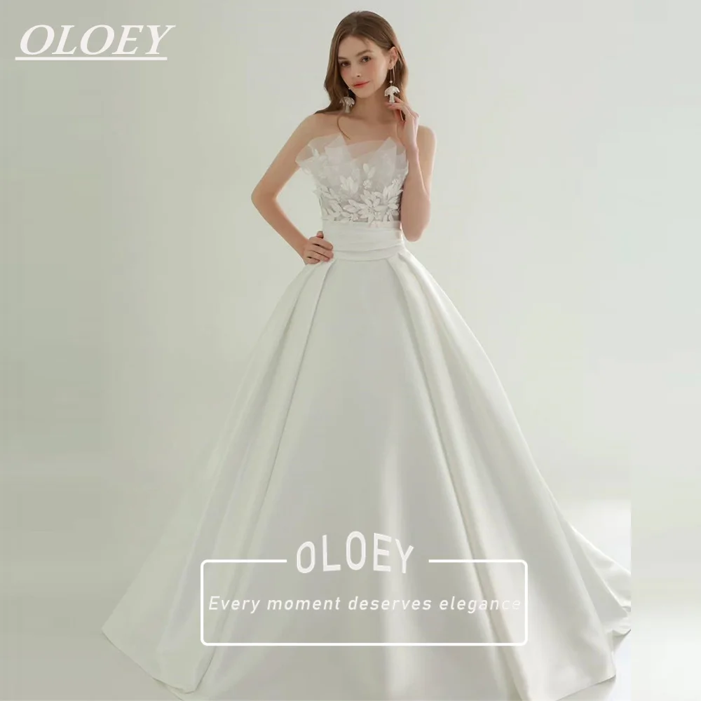OLOEY Elegantes trägerloses A-Linien-Hochzeitskleid Korea Photoshoot Plissiertes Brautkleid mit Applikationen Maßgeschneiderte Robe De Mariage mit Schnürung