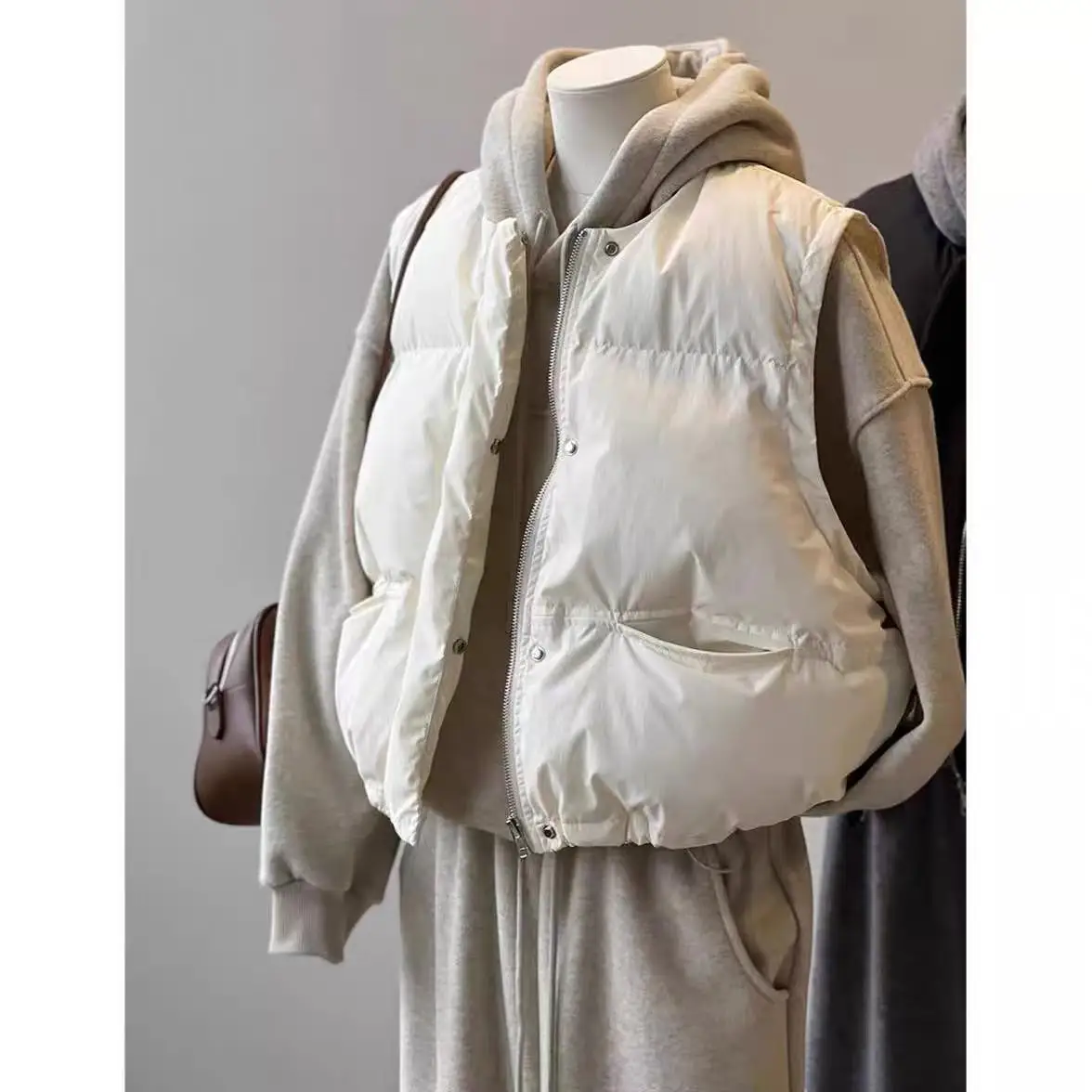 سترة نسائية كورية شتوية دافئة مبطنة بالقطن بدون أكمام بجيوب كبيرة سترات سميكة للنساء