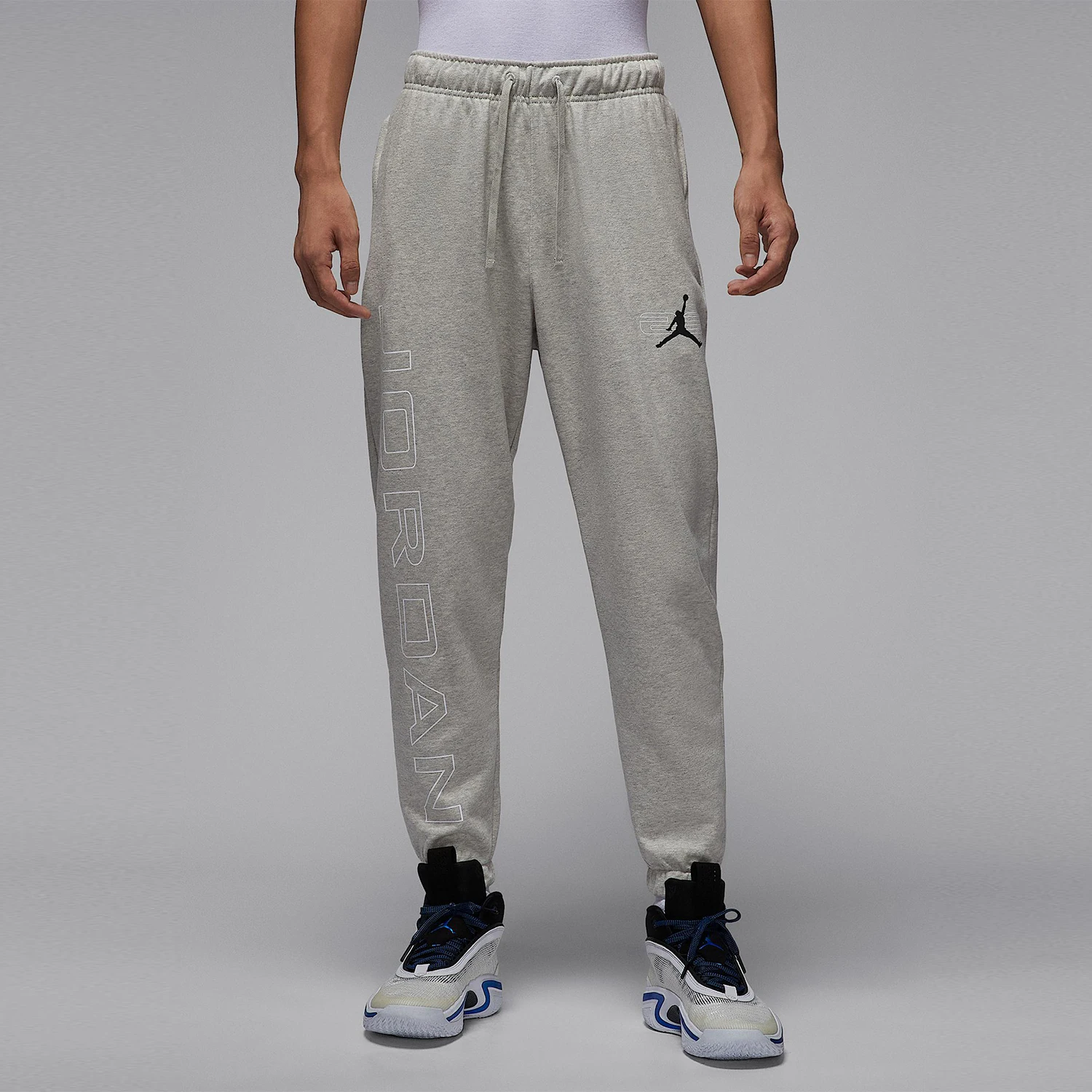 

Оригинальные мужские повседневные брюки Nike JORDAN с трикотажными вставками и завязками HQ8700-050