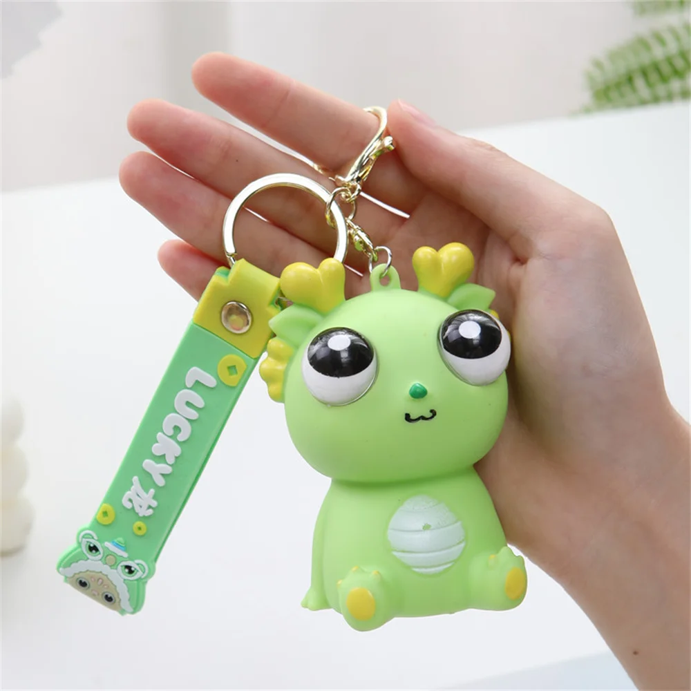 Funny Lucky Dragon Keychain Car Key Bag Pendant Big Eye Popping Dragon Shakes Sound Exploding Dinosaur Decompression Toys