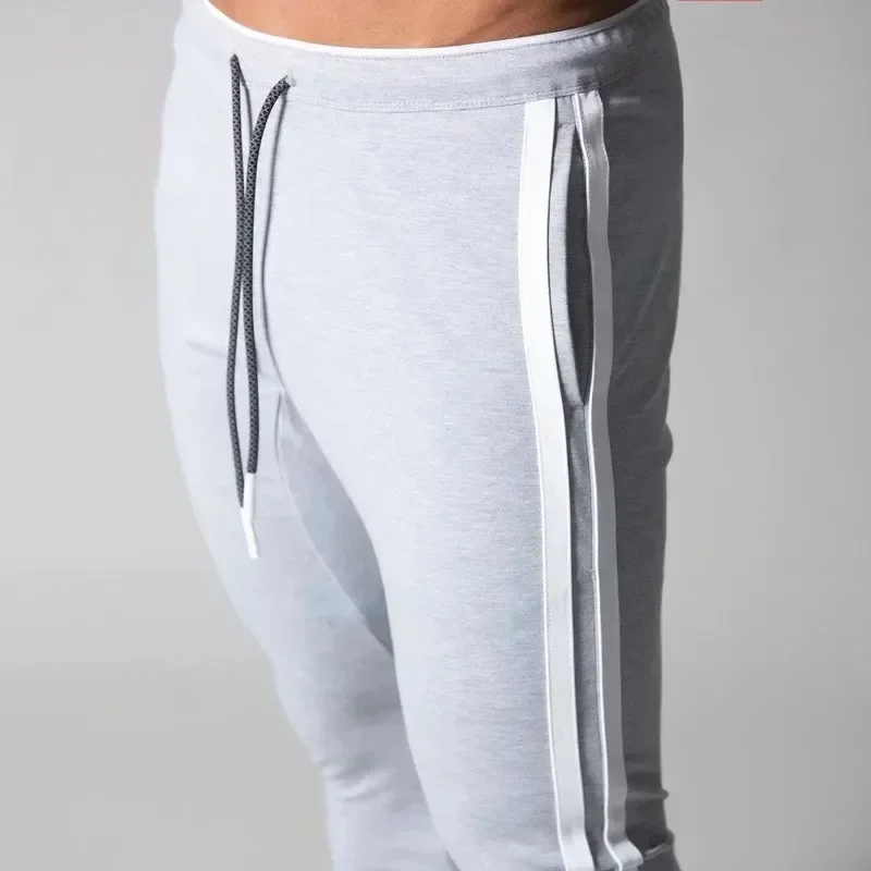 Joggers férfiak csíkos sweatpants Lezser stv nadrágot férfiak Használhatóság Futóverseny Álmatlanul pályán Nadrág