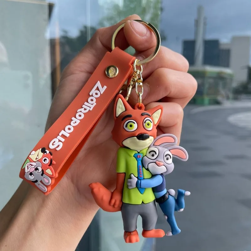 مجموعة سلسلة مفاتيح للزوجين من Disney Anime Zootopia Judy Hopps وNick Wilde - شماعة حقيبة الظهر مناسبة لتقديم هدايا عيد الميلاد