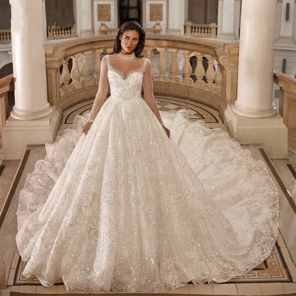 Abiti da sposa personalizzati con paillettes di cristallo con perline scintillanti di lusso 2025 Abiti da sposa in tulle con illusione di strascico senza schienale