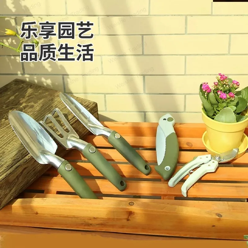 Gardening, flower tool set, garden planting flowers, digging shovels, rakes, pruning shears, handsaws
