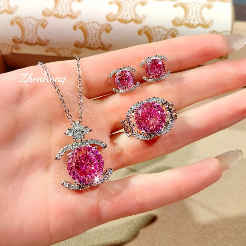A delicate circular Paráiba jewelry set, featuring beautifully cut gemstone necklaces, earrings and rings, for ladies' party wea
