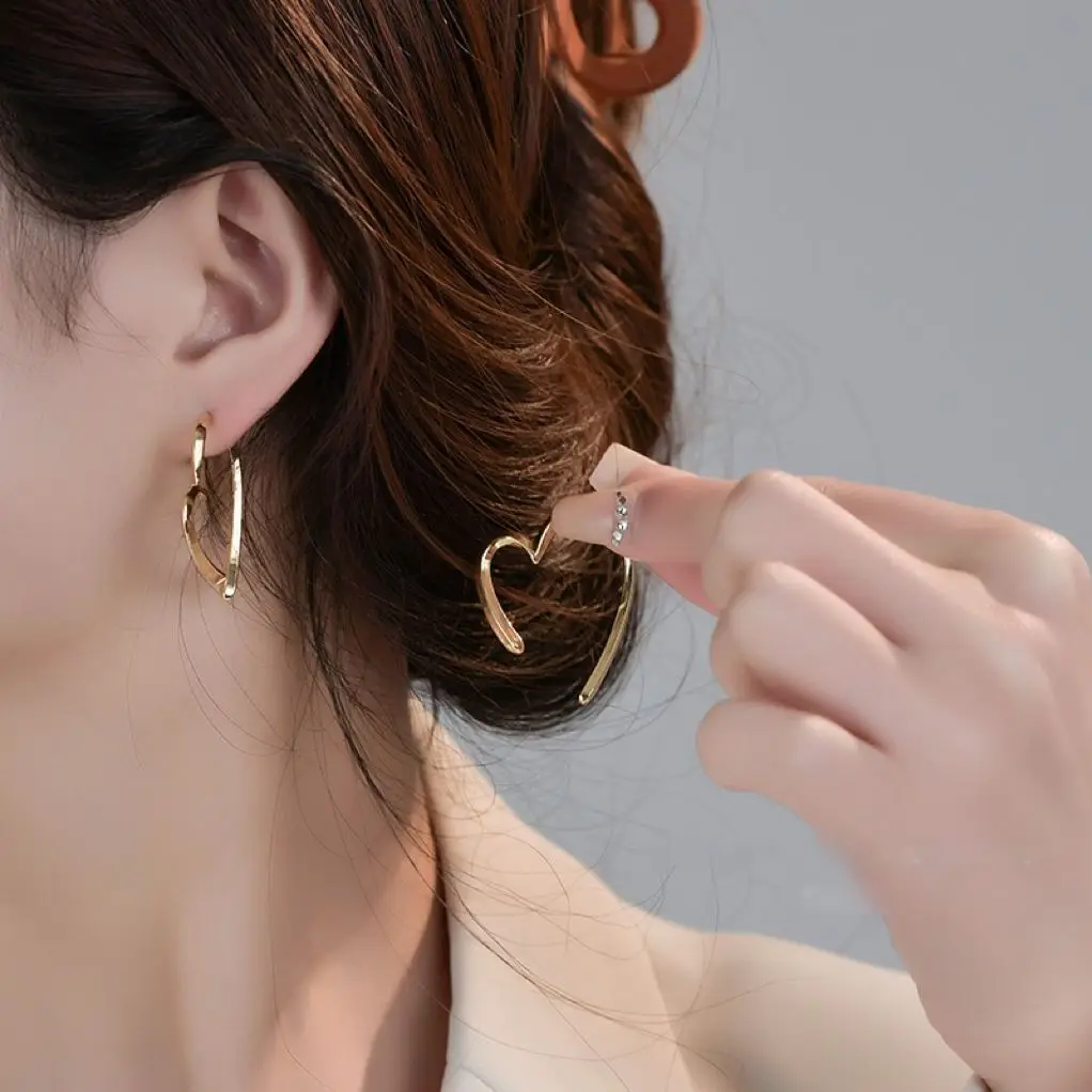 Pendientes de diseño único para mujer, aretes elegantes y luminosos de lujo, joyería de amor para fiesta de boda, regalo Premium, nueva tendencia de moda, 2023