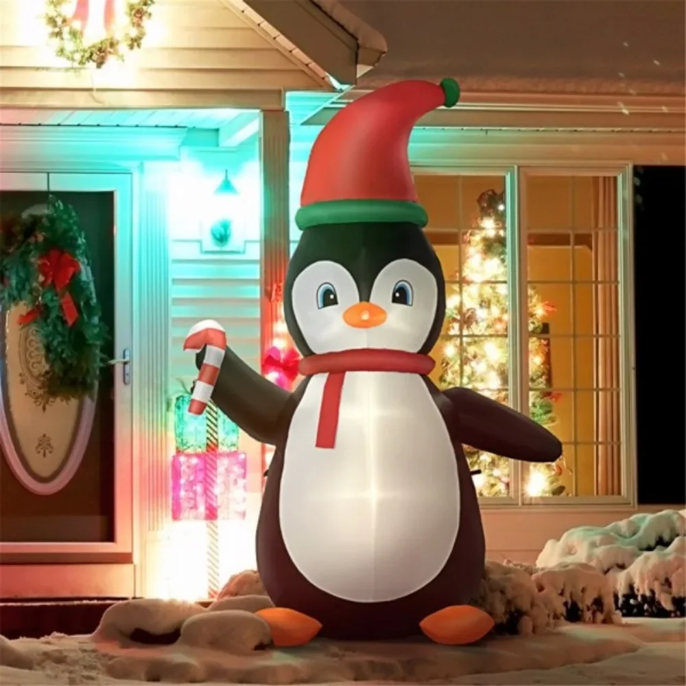 Penguin inflatables wearing Santa hats bring together a cohesive Christmas display - LED lights create a cheerful effect