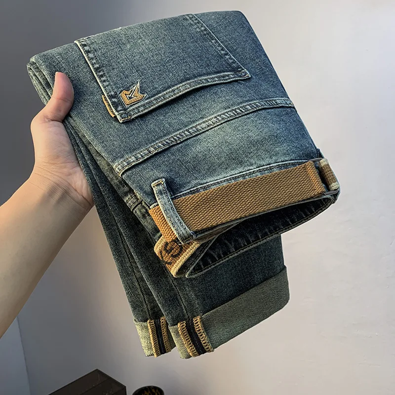 2024 autumn jeans men's fashionable Korean style slim fit fashionable embroidered denim trousers loose elastic