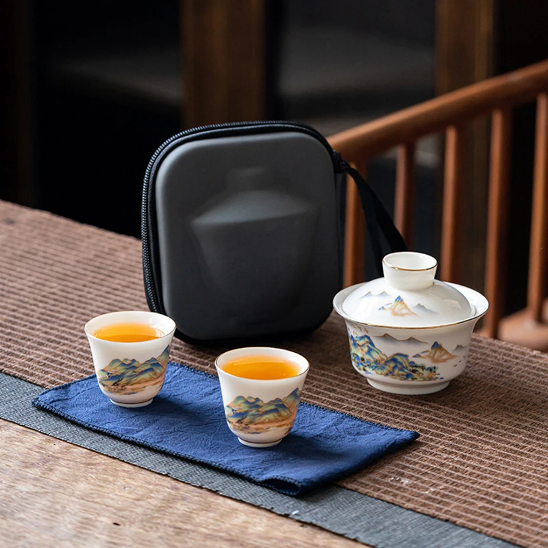 

Lamb Fat Jade Porcelain High-end Outdoor Portable Travel Tea Set Chinese Ceramic Portable Tea Set Quaker Cup One Pot Two Cups