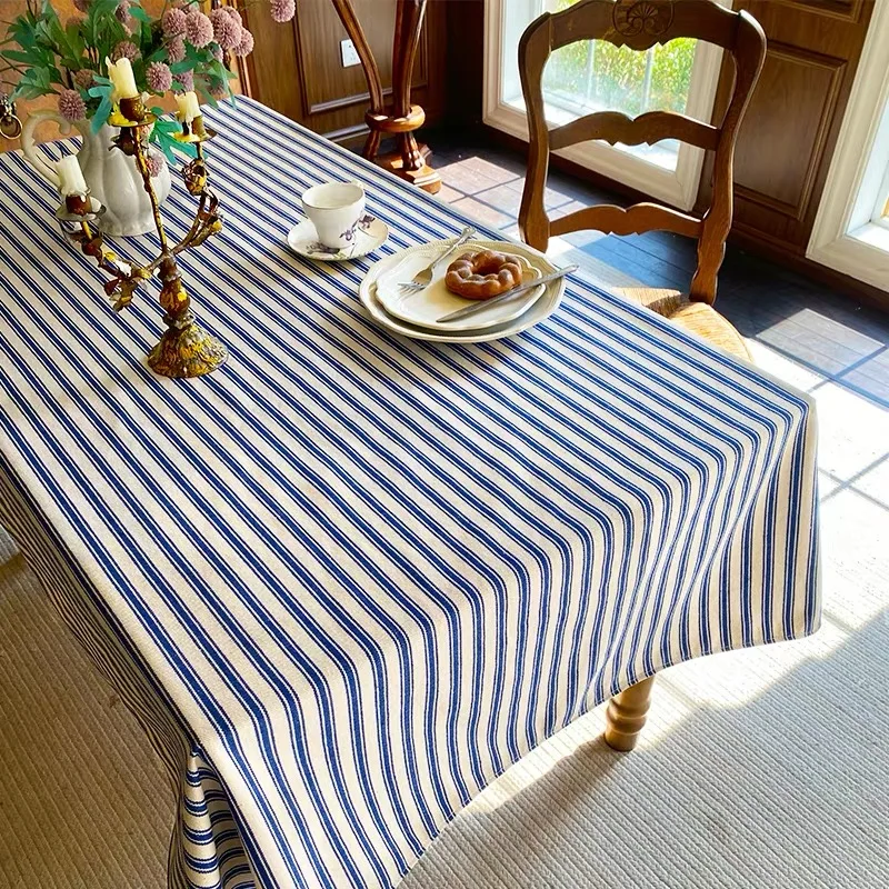 One blue and white striped tablecloth, an outdoor tablecloth for creating a fresh and casual picnic atmosphere.