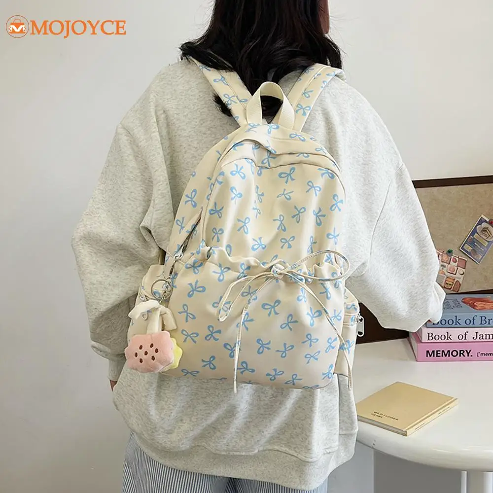 

Girls Cute Bowknot Backpack Casual Bookbag Travel Daypack Sweet Bow Print Students School Bag Women Aesthetic Drawstring Bags