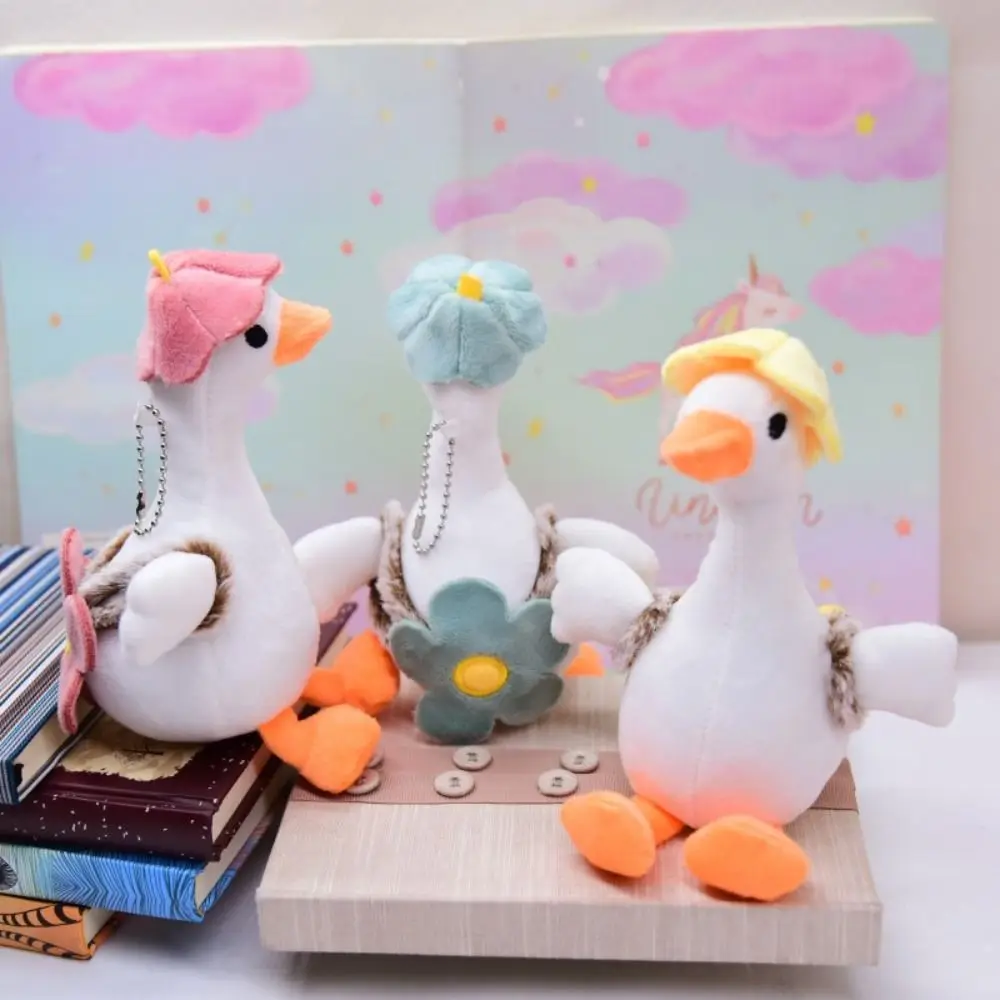 Mini flor grande ganso branco chaveiro mochila encantos de pelúcia animal pingente estilo coreano dos desenhos animados boneca de pelúcia feminino