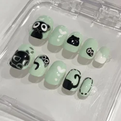 24Pcs Uñas Postizas Cortas Verdes Patrón de Pequeño Gato Negro Dibujos Animados Juego Completo de Uñas Falsas Reutilizables Consejos de Uñas Acrílicas para Niñas