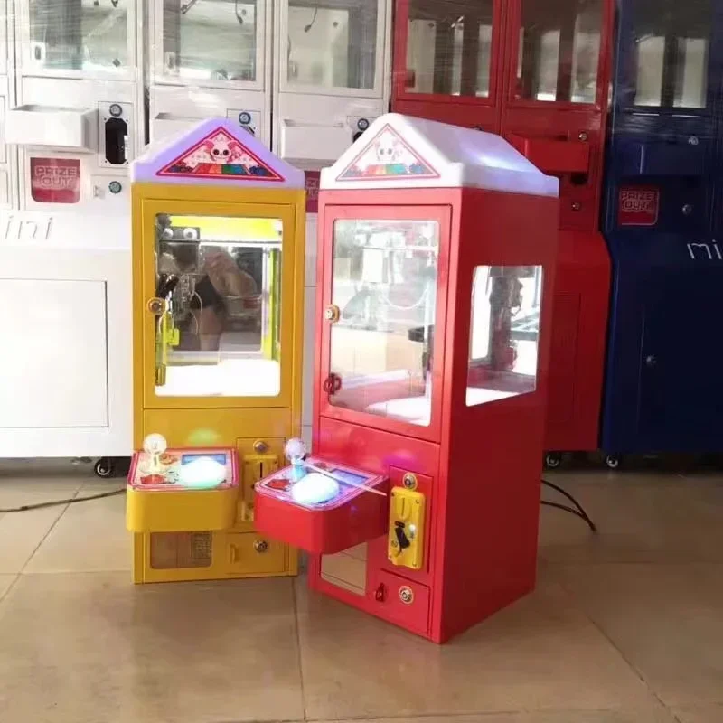 

Unique and niche Mini boutique toy claw machine remote control custom coin doll gift crane