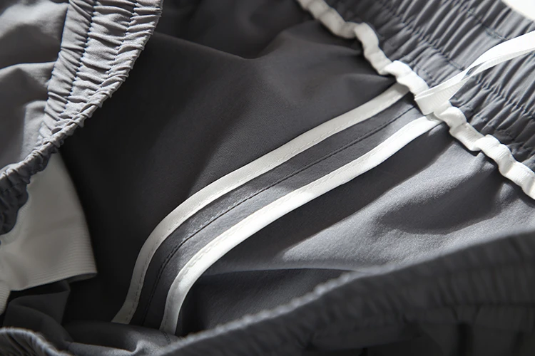 شورت رجالي صيفي فضفاض وعصري بتصميم كتل الألوان، يمنح الراحة الفورية وامتصاص الرطوبة، بطول خمسة أرباع، يناسب الأسلوب الحضري. #2