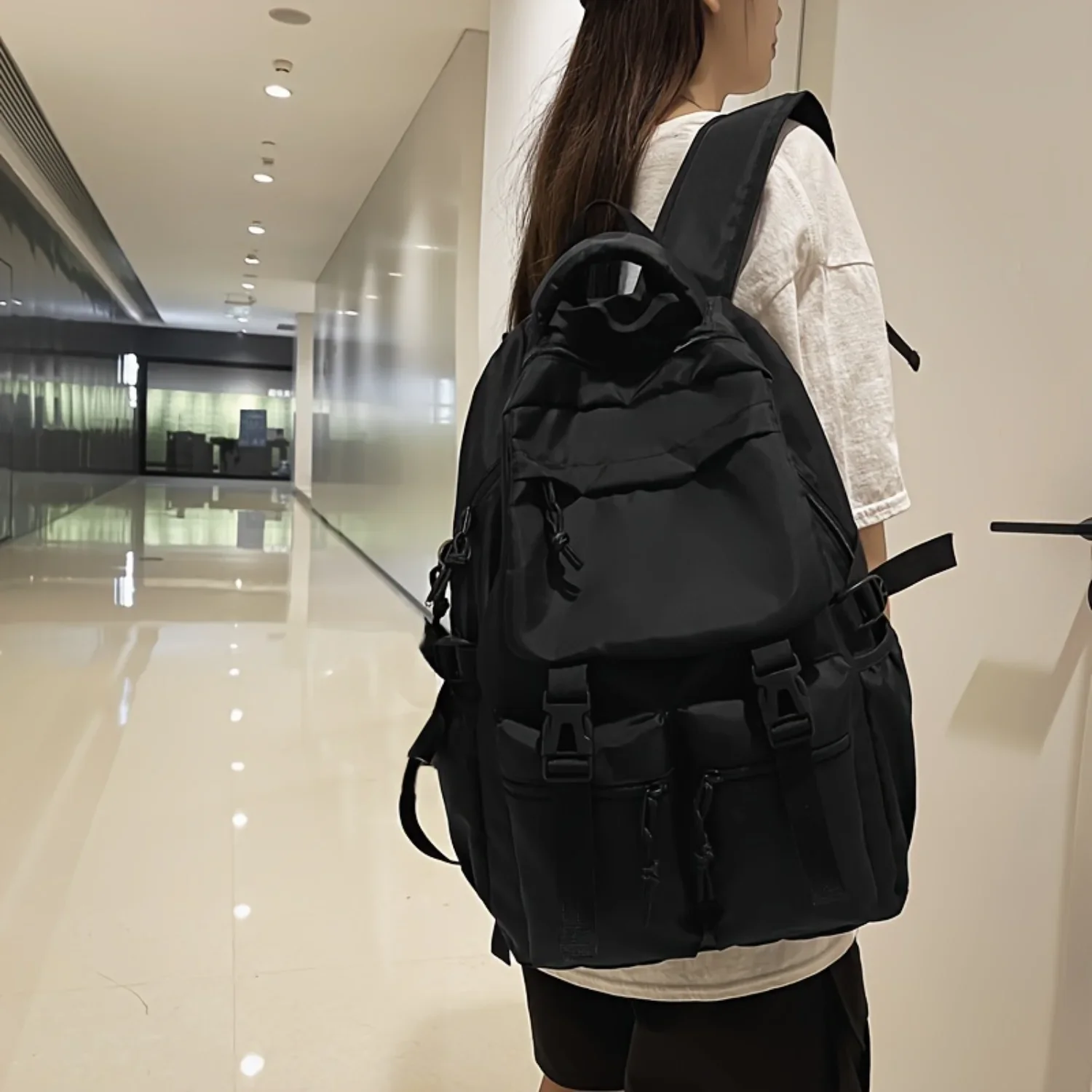 

Stylish, Roomy Capacity Flap Backpack with Front Pocket, Casual Nylon Travel Bookbag with Pendant, Ideal for School or Travel Us