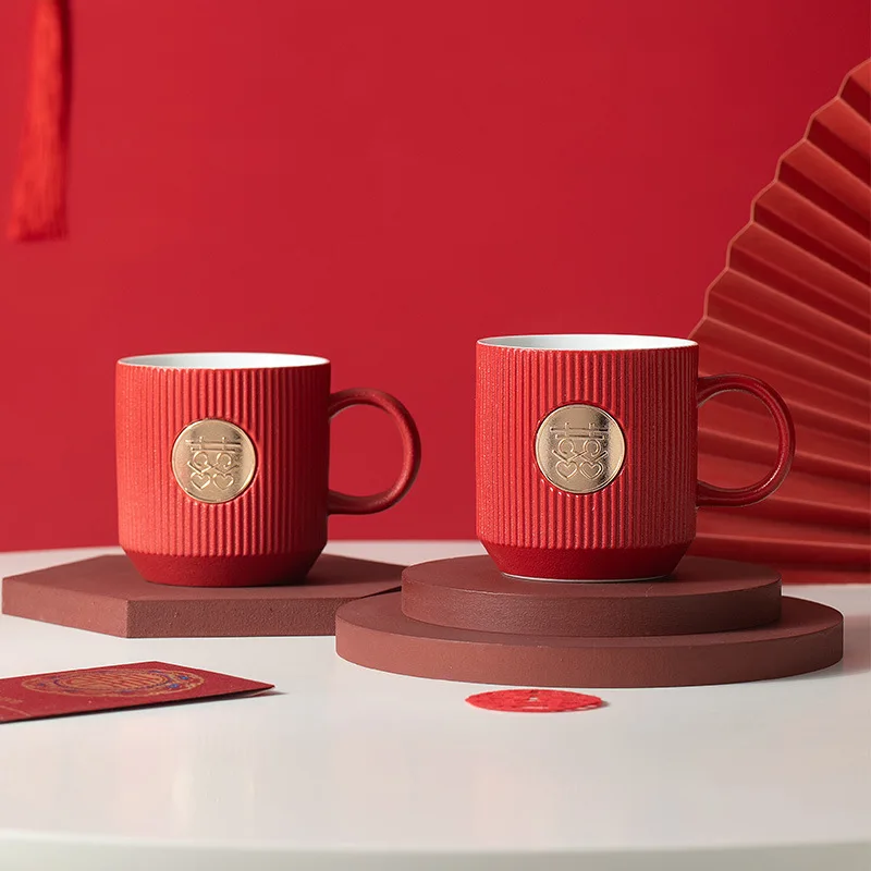Ceramic wedding couple mugs with red double‑happiness symbol, for newlyweds, used as drinking and tooth‑brushing cups