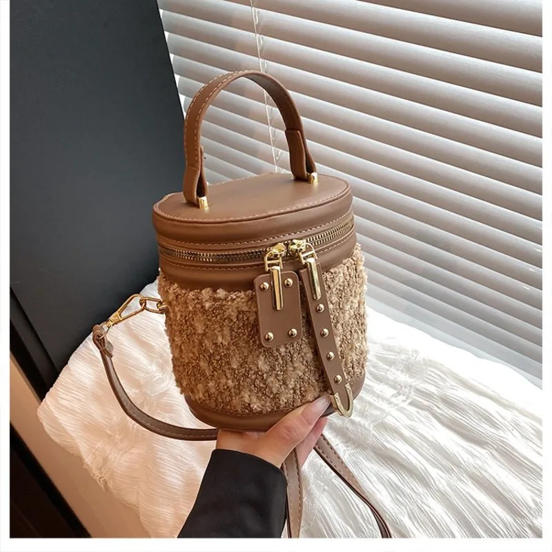 

Classic Vintage Inspired Handbag With Solid Color And Textured Finish Designed Also As A Versatile Commuter Diaper Bag