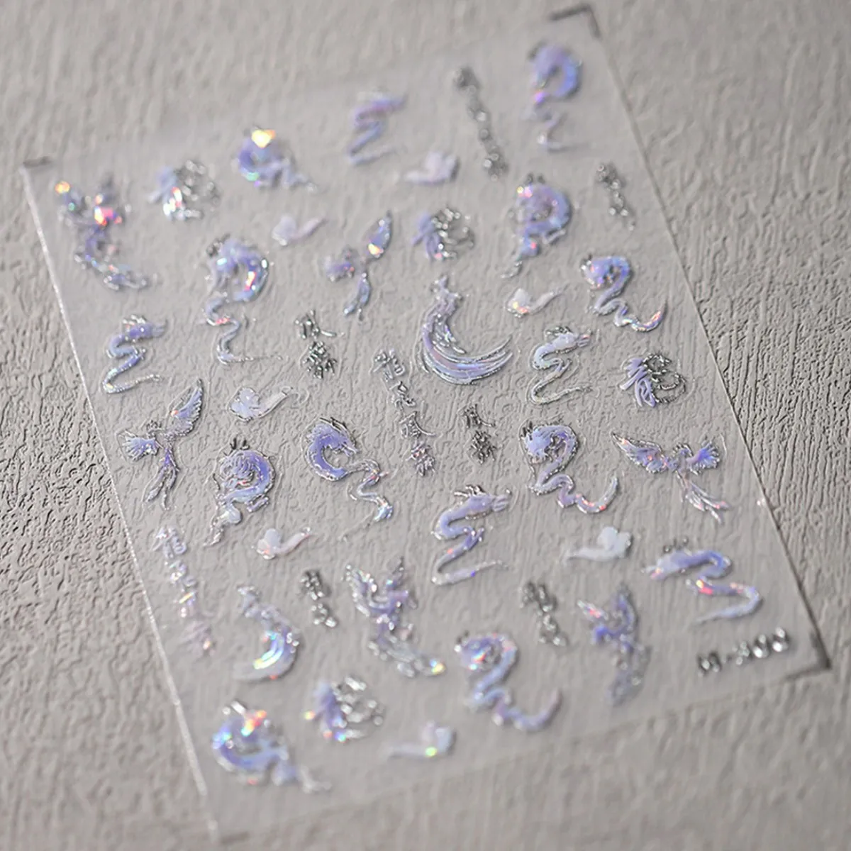 1ชิ้นสติกเกอร์ตกแต่งเล็บมังกรสีบรอนซ์น่ารักแบบมีกาวในตัวดีไซน์ลายนูนแวววาวสติกเกอร์ฟอยล์แบบ DIY