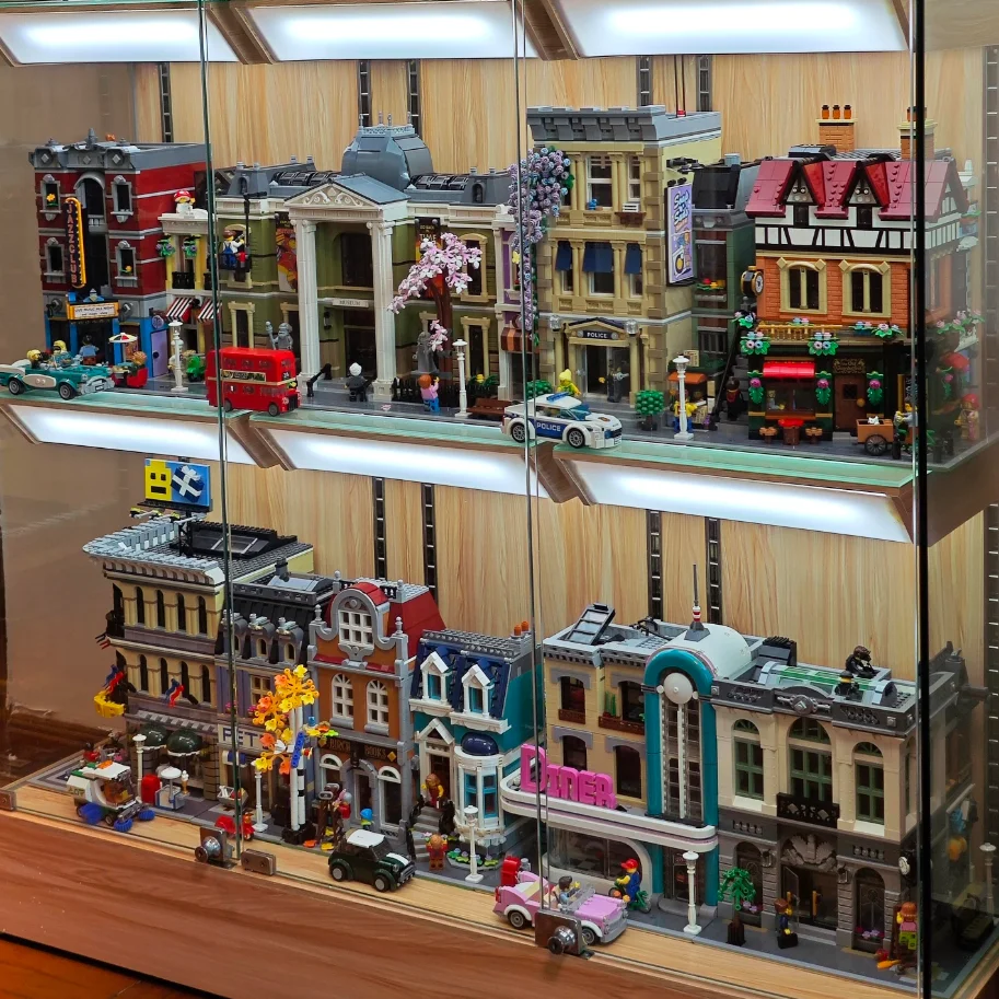 

Креативный конструктор MOC: Модели зданий и уличных сцен (Кафе, Уголок, Книжный магазин, Дом, Здание банка, Здание зоомагазина, Здание городской управы, Ресторан в центре города)