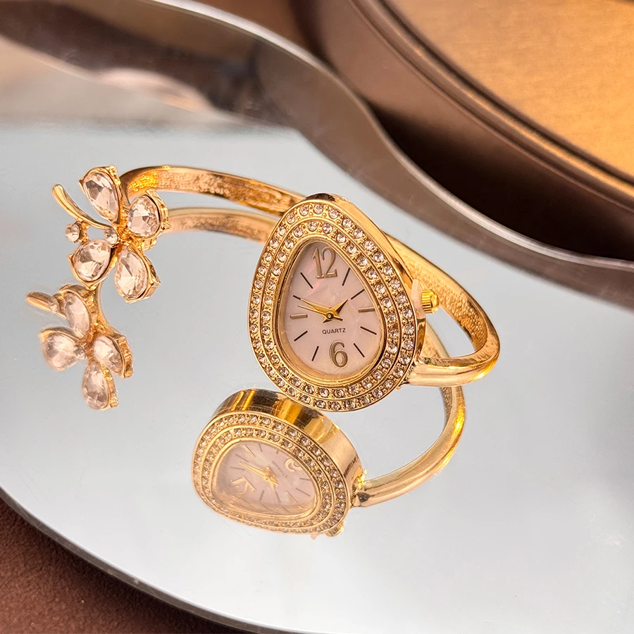 

Женские кварцевые часы с четырьмя листами клевера, браслет с открытой ручкой и отрывной ручкой, высокоэстетичная роскошная новая модель, элегантный часы
