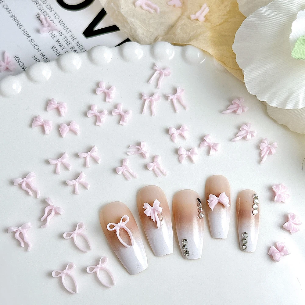 50 stücke Mix Stile Rosa Bowknot Nagel Charms Band 3D aushöhlen Kawaii Nagel Dekorationen Harz Bogen Schmetterling Maniküre diy Teile