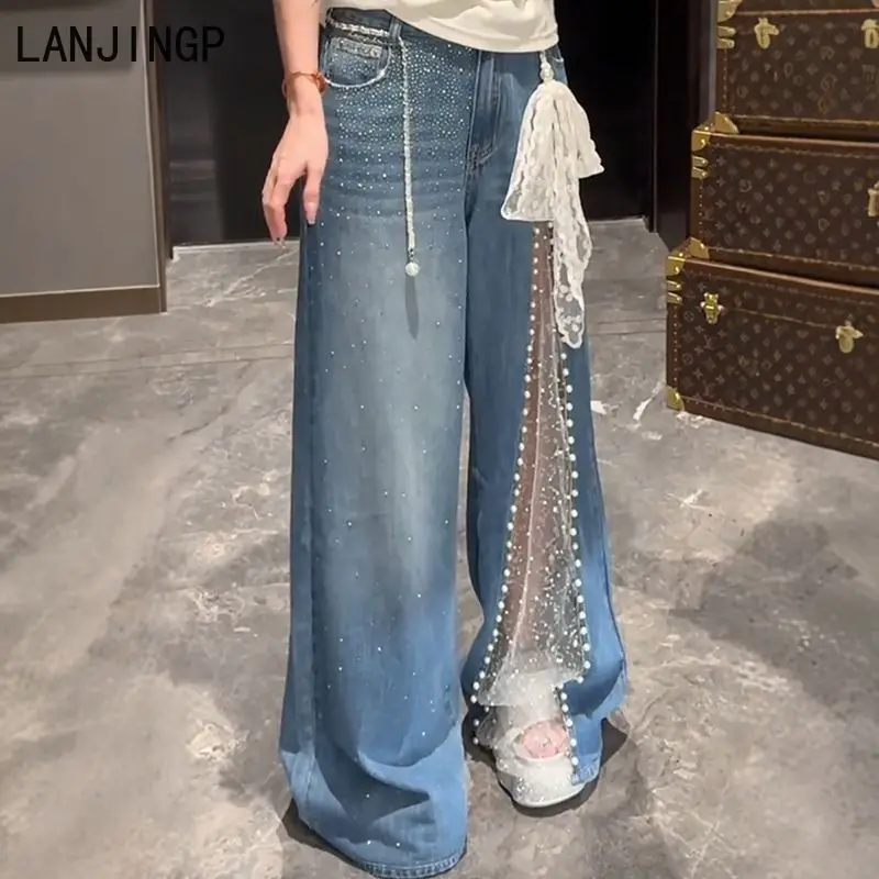 Mantianxing hot diamond mesh stitching heavy industry beaded jeans women's 2025 summer new drape wide-leg pants tide