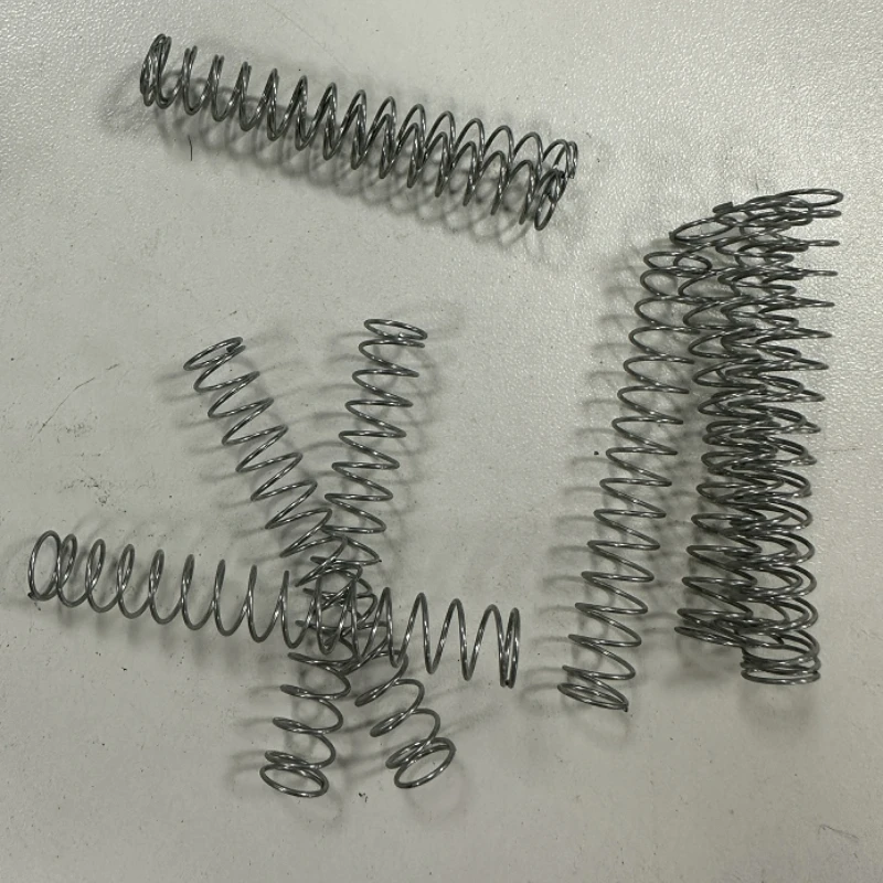 10 قطعة/الوحدة سلك ضياء 0.6 مللي متر ضغط الربيع الصلب OD 3 مللي متر-15 مللي متر طول 50/60/70/80/90/100 مللي متر نوابض الضغط الصغيرة #6