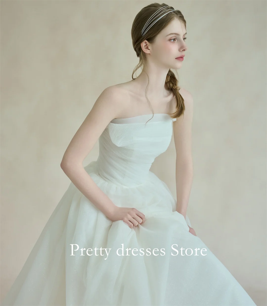 ชุดแต่งงานทรงเอไลน์ผ้าทูลล์สีไอวอรี่แบบไม่มีสายรัด ดีไซน์หรูหราสไตล์ปี 2025 สำหรับงานแต่งงานในสวน  ชุดเจ้าสาวแบบคอร์เซ็ทสำหรับงานปาร์ตี้