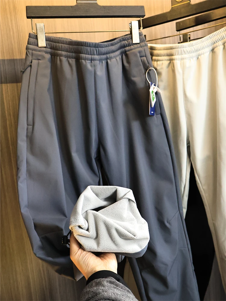 

Мужские однотонные спортивные брюки на открытом воздухе, мягкие повседневные брюки, термопоглощающие, тонкие, ветрозащитные, водонепроницаемые, осенне-зимние...