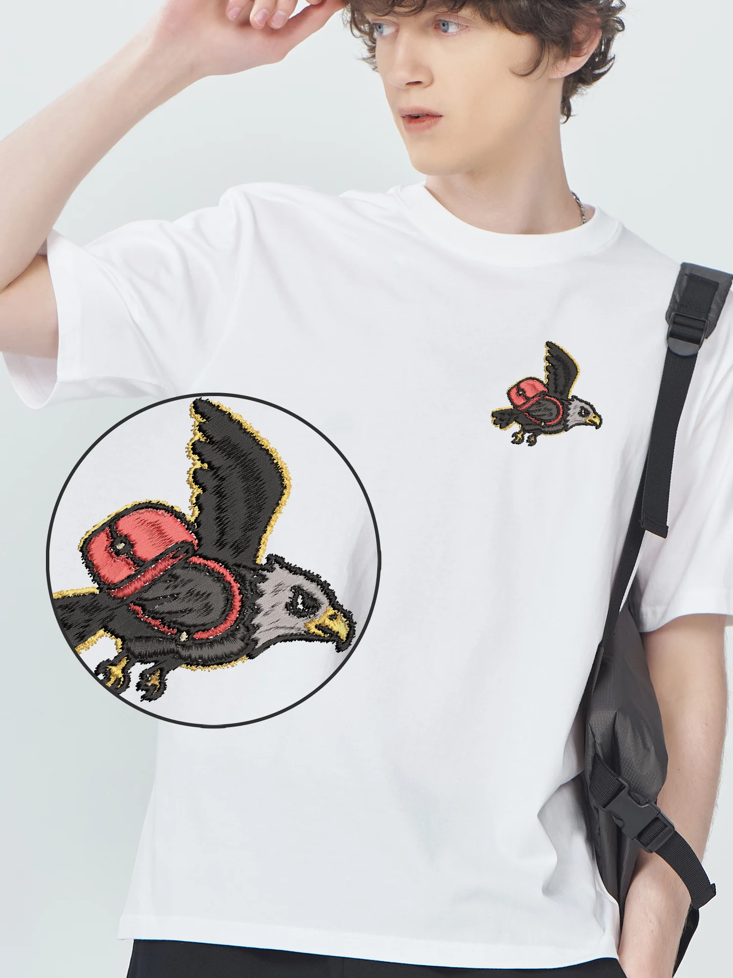 

Eagle With Backpack Funny Embroidered Graphic Tee Men Cotton Summer Fashion Gift Idea Embroidery T-Shirt Unisex Leisure​