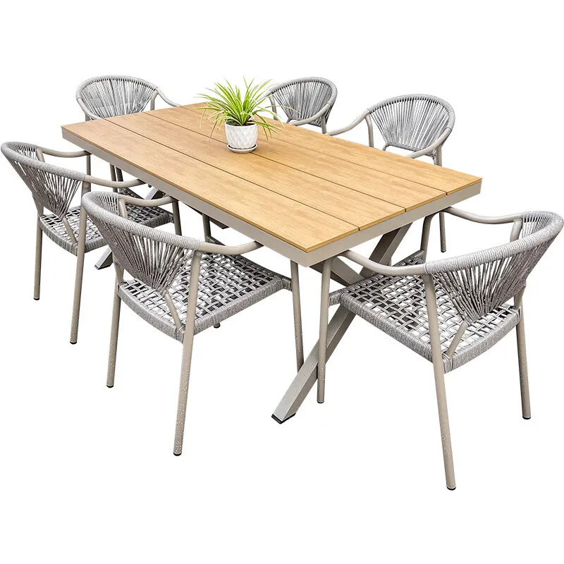 

Nordic outdoor woven rattan chair high-end outdoor table and chair courtyard garden plastic wood table