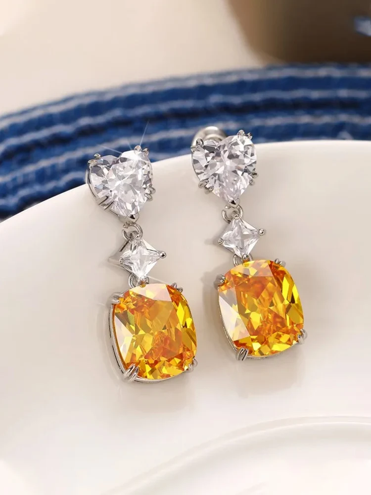 Huitan schillernde gelbe Zirkonia baumeln Ohrringe für Frauen Temperament Verlobung Hochzeits feier Accessoires Modeschmuck