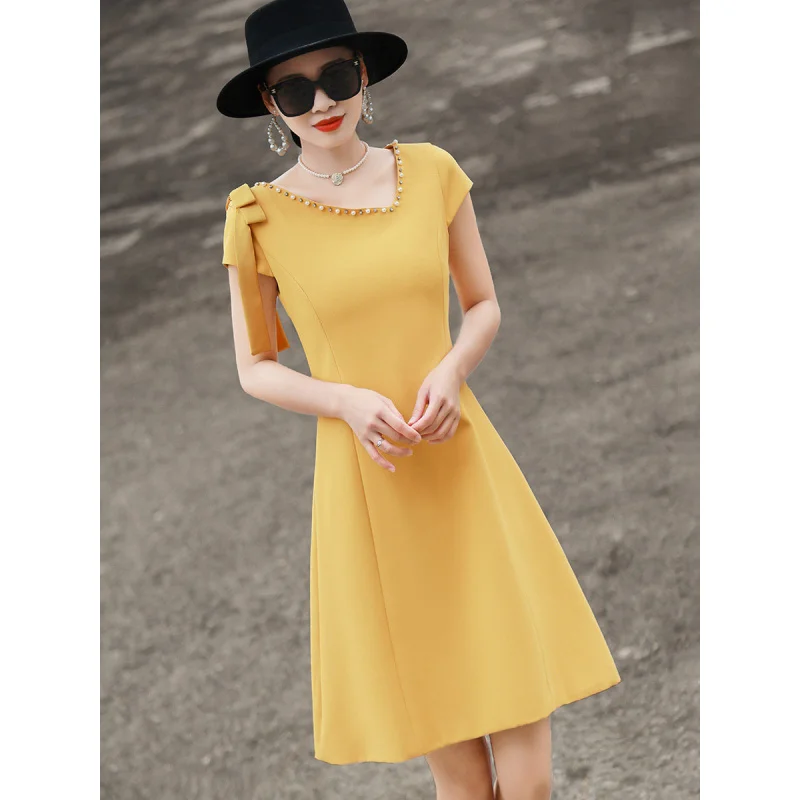 

MEXCOCO 2026 New Summer Elegant Commuter Off Shoulder Beaded Neck Bow Decor Short Sleeve Slim A Line Midi Dress