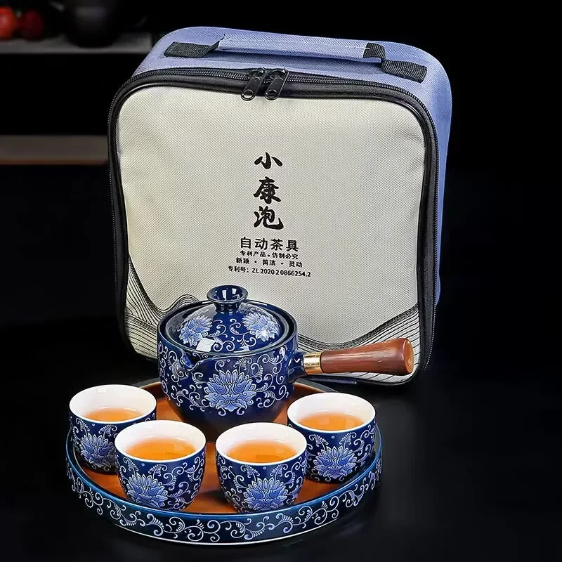 Portable Travel Tea Set Complete Set of Ceramic Kung Fu Automatic Rotating One Pot Four Cups Side Handle Tea Maker Chinese Gift