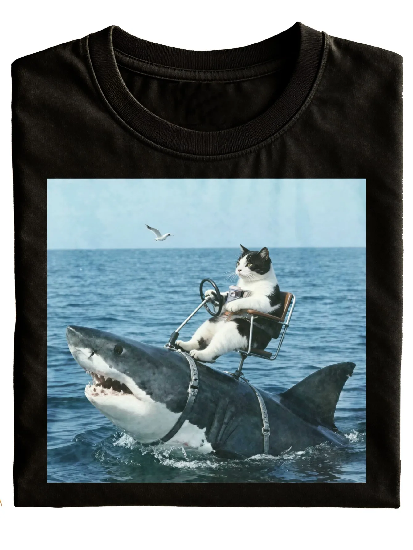 New Style Funny Cat Riding Shark T-Shirt Unisex Black Graphic Print with Cat Driving A Shark On Ocean Background Casual Wear for Everyday Outings And Fun Gifts for Holidays   Fashionable And Versatile Short Sleeve Top Perfect for Daily