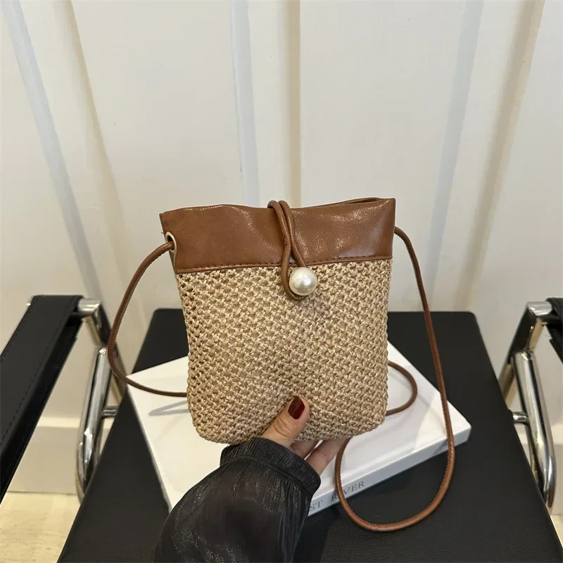 Handwomen mobile phone bag women's versatile shoulder messenger handbag niche mini straw change bag