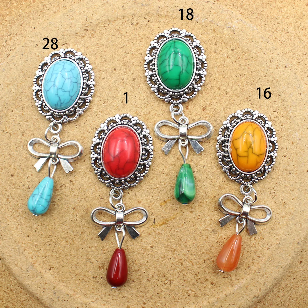 Factory direct sales 4pcs/lot antique silver hollow bow cracked flower plate pendant DIY mobile phone chain headpiece hand sewn