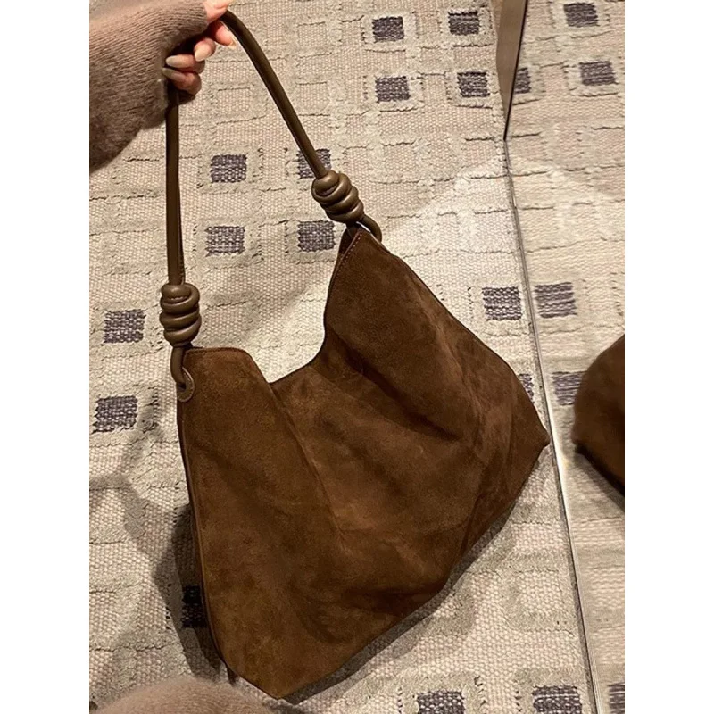 

Легкая роскошная женская сумка-тоут в стиле ретро, новинка 2025, осенне-зимняя нишевая дизайнерская модная повседневная сумка для пригородных поездок