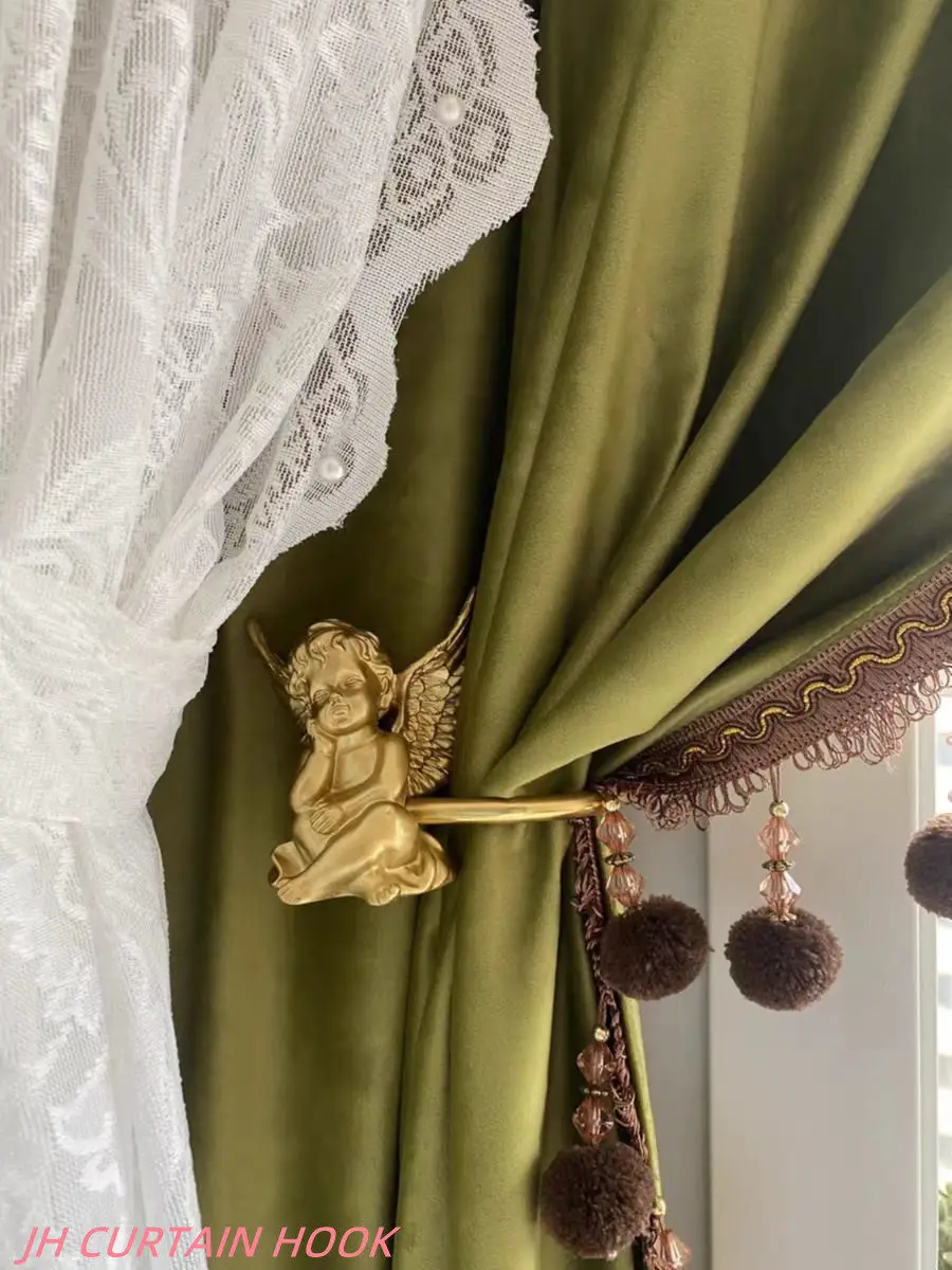 

No punching angel curtain hook French brass color vintage light luxury living room bedroom wall hook small red book