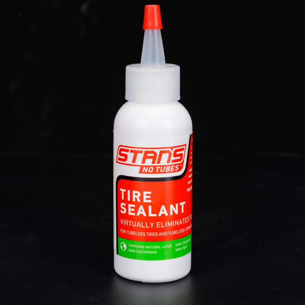 Stan\'s Bicycle Tire Sealant Tubeless 2 Ounce Bottle Natural Materials Seals Quickly