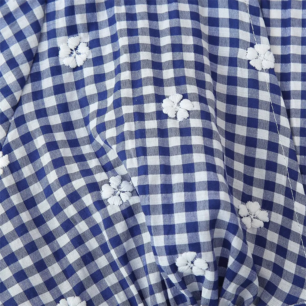 Verão novo feminino doce e versátil com decote em v mangas bufantes flor bordado pequena grade curto topo