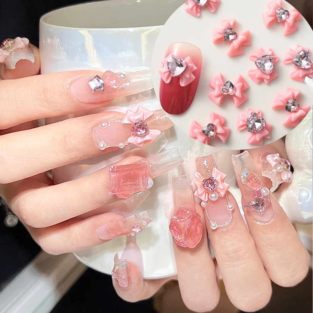 

10pcs Pink Ribbon Resin Bow Nail Charms with Heart Rhinestone 10*12mm/8*10mm 3D Bowknot Nail Jewelry Love Diamond Bow Nail Parts