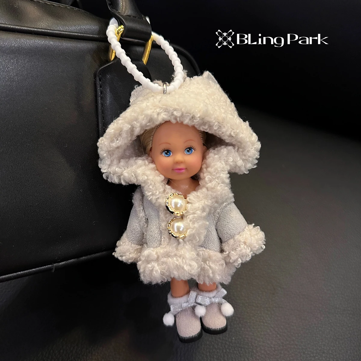 التصميم الأصلي حقيبة قلادة موضة فروي سترة فتاة دمية على شكل أميرة المفاتيح قلادة النسخة الكورية لطيف الوجه دمية أفضل الهدايا