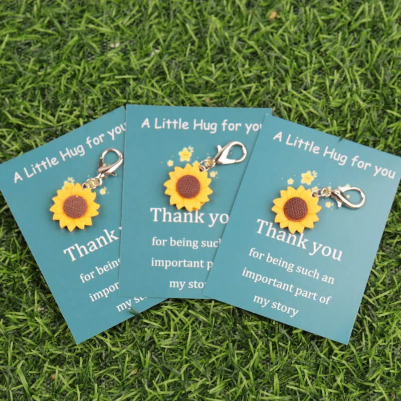 1/3Set Mini colgante de girasol de resina, lindo y adorable, con tarjeta de felicitación inspiradora. Regalos emocionales para familiares y amigos - Un pequeño obsequio.