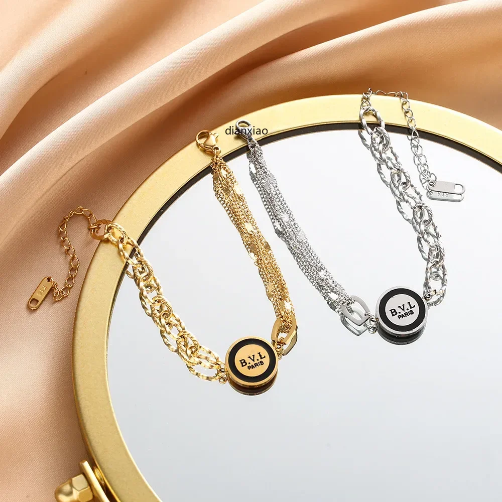 Этот новый популярный черный многослойный асимметричный браслет с буквами OL Bvl и выдолбленным узором