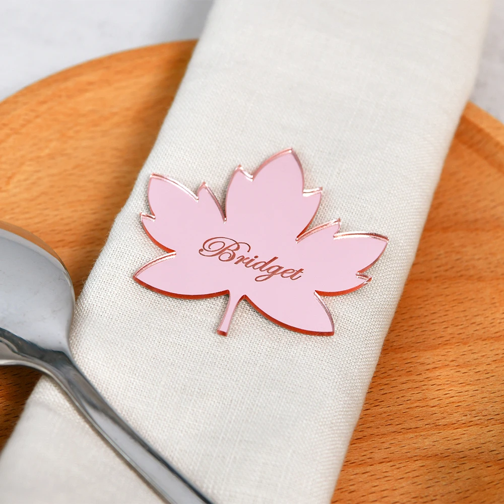 

Personalised party supplies. Acrylic mirror engraving. Customised Text, Dinner plate nameplate. Maple leaf shaped napkin plate.